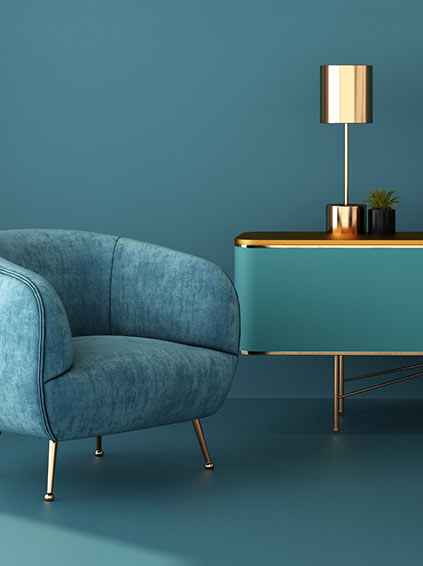 A blue chair and table in a room.